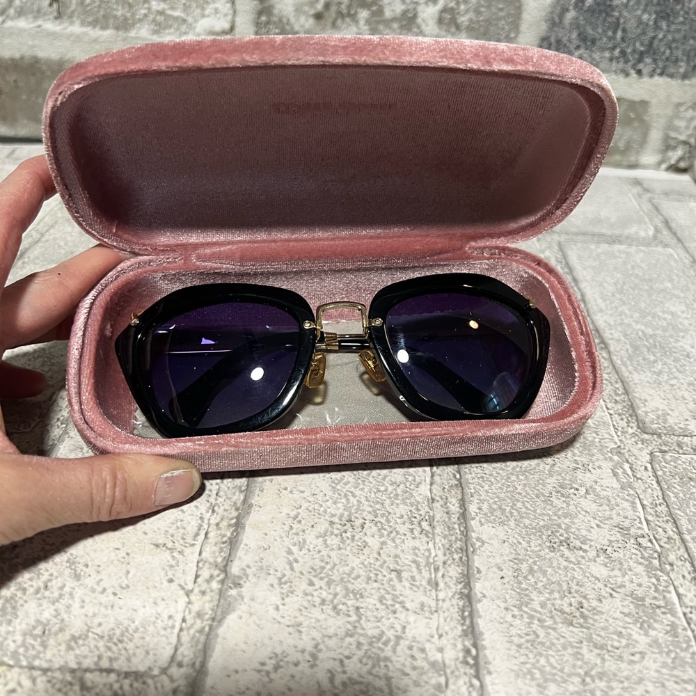 MIU MIU sunglasses SMU10NS 1AB-3M1 54023-135